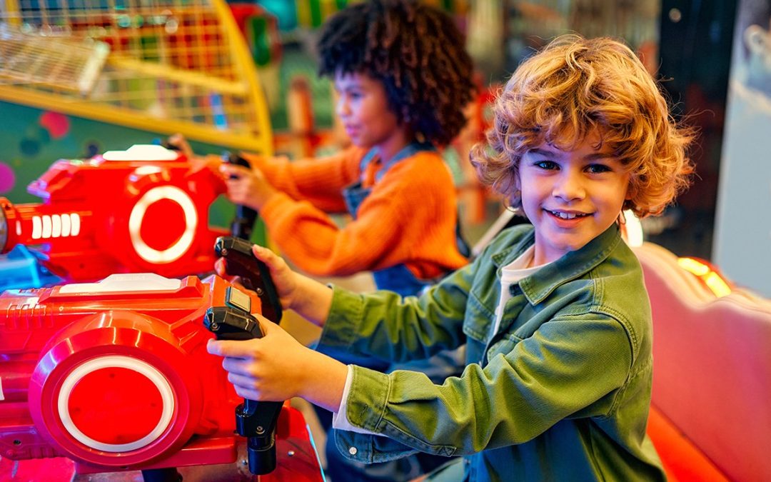 kids having fun on a carnival carousel